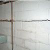 Severe foundation damage from a long crack in a bucking wall of a Douglasville home.