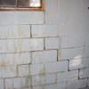 A cracked foundation wall near a window in a Stockbridge home