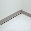 A partition wall separating from the floor in a Carrollton home.