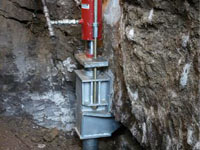 Foundation repair contractors lifting a structure in Alpharetta.