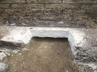 Preparing a foundation footing for helical pier installation in Smyrna