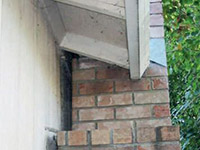 A chimney leaning away from the home on a Duluth foundation