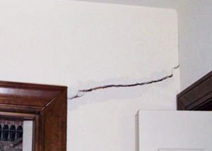 A large drywall crack in an interior wall in Smyrna