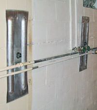 A foundation wall anchor system used to repair a basement wall in Duluth