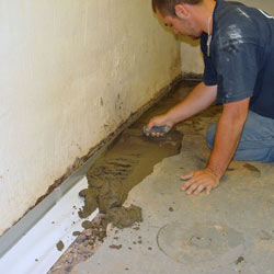 Testing a French drain system in a Newnan home.