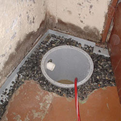 Installing a sump in a sump pump liner in a Roswell home