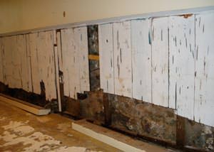 A wet, flooded finished basement in Woodstock