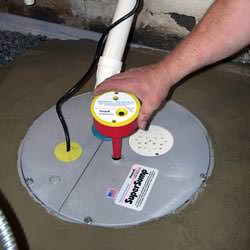 A newly installed sump pump system in a basement in Suwanee