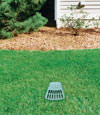 A buried gutter drain downspout extension installed in a Griffin home