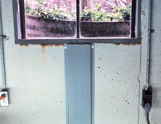 Repaired waterproofed basement window leak in Marietta